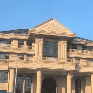 嘉峪关黄金麻别墅外墙干挂石材效果示例